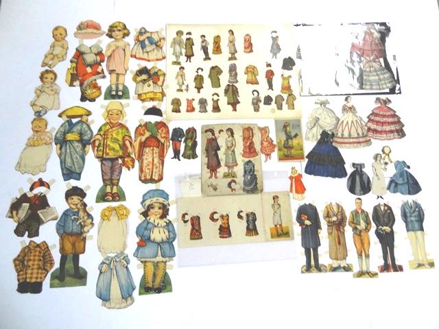 Assorted Early Paper Doll Sets: Peter G. Thomson uncut folder Louise with soiling, Peter G. Thomson Ruth uncut folder with soiling, 4.5" lady with 3 dresses and 1 hat, 5.5" cutout doll with 5 dresses, 6" doll with 4 dresses and 1 ha