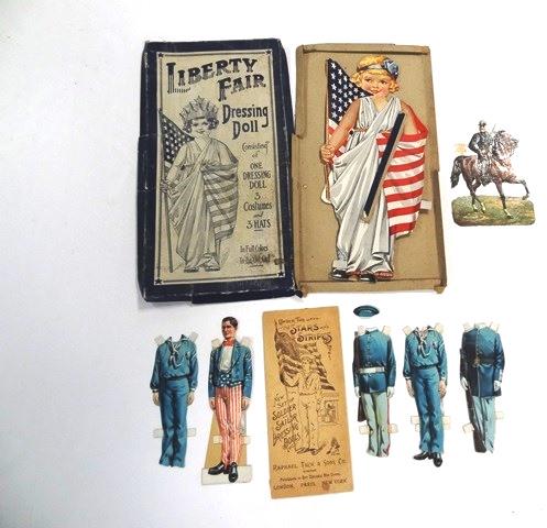 Early Patriotic Paper Dolls: General U.S. Grant on horseback die-cut 6"H in excellent condition, Raphael Tuck Under The Stars And Stripes has original envelope with minor tears, 7.5" doll with neck bend, 8 costumes and 1 hat, Lib