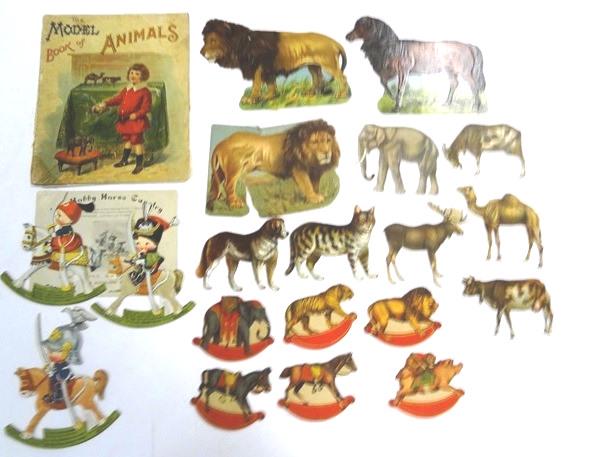 Antique Animal Paper Doll: The Hobby Horse Calvary by H.H. Co. New York has original envelope, 3 colorful rocking horses with Calvary boys dresses in German, Austrian and Turkish costumes 7"H, 6 f&b animal rocking toys 5"W, Rap