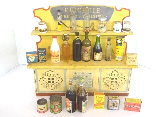 Vintage French Toy Store Display: Vintage litho paper over wood French store display 13"W, 11"H with an assortment of advertising bottles and tins