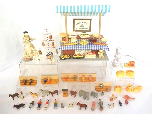 Vintage Toy Bakery Stall & Erzgebirge Accessories: Vintage English wood bakery stall with fabric roof 7"W, 6.5"D, 7"H by Caroline Watt Designs, with a nice assortment of cakes, pies and breads, clothes pin doll, group of small Erzgebirge figures and a