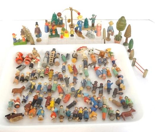 Vintage Erzgebirge Small Accessories: Large group of small painted Erzgebirge accessories, figures and trees, also plastic boats and cannons and a metal picnic table with umbrella