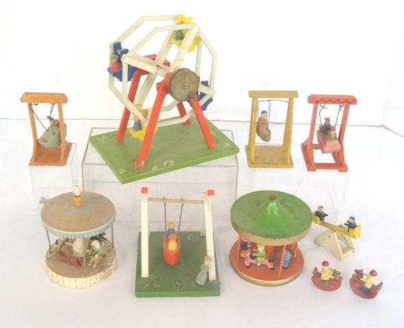 Erzgebirge Circus Ride Toys: Vintage Erzgebirge wood circus rides, 2 merry go round, Ferris wheel 5"H, boat rides, see saw and rocking horses