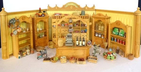Dollhouse Store Room Box & Fixtures: Nicely made wood collapsible store room box, 3 walls and columns surround wood floor, 29"W, 11"D, 12"H, comes with 7 store display cabinets and a counter with damaged hanging rack, glass canister fill