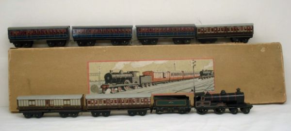 French Tin Miniature Train Penny Toy: Box says: Product of Paris France, # Form 796. Train Says George the First on Engine #513, Cars have lithographs of windows, Box size is 15" long, Engine is 2 7/8", car sizes are 3 1/4"