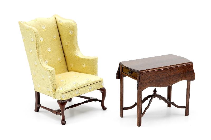 Runyon Wing Chair & Table Dollhouse Miniatures: Unsigned Queen Ann style wing chair in the style of Paul Runyon, mahogany cabriole legs with stretchers, yellow/green upholstery with small flower pattern 3.75"H, mahogany drop leaf Pembroke table wit