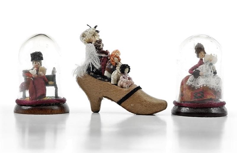 Ligia Young Dollhouse Dolls Miniatures: Ligia Young miniature artisan doll of woman sitting on bench feeding the pigeons housed in wood and glass dome 1 5/8"H, miniature lady doll holding a baby housed in dome 1 5/8"H, Old Mother Hubbard an