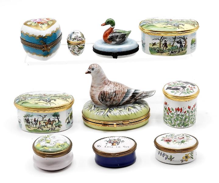 English & French Trinket Box Collection: Group of seven English Hayclon Days Bilston & Battersea enamel decorated porcelain boxes 1.25"L to 2.75"L, French Chamart Limoges pigeon box 3.75"L, French Limoges heart form box with small perfume bo