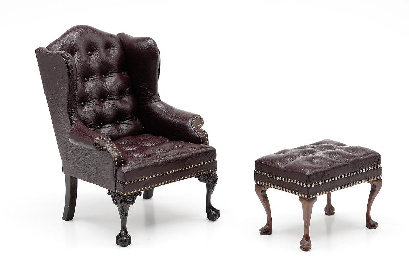 Gail Steffey Wing Chair & Ottoman Dollhouse Miniatures: Gail Steffey brown leather Chippendale style wing chair with button tufting and brass tack decoration 4"H with matching ottoman