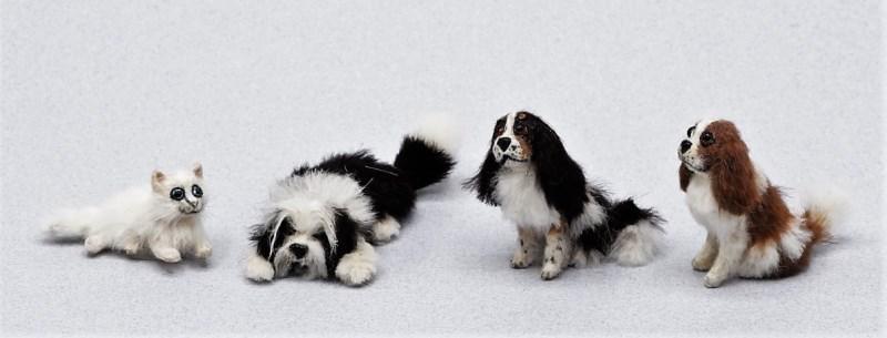 Annie Willis Artisan Animals Dollhouse Miniatures: Annie Willis artisan miniature fur covered animals, a pair of black and brown sitting King Charles Spaniels 1.5"H, black and white reclining sheepdog 2.5"L, white cat 1.5"L