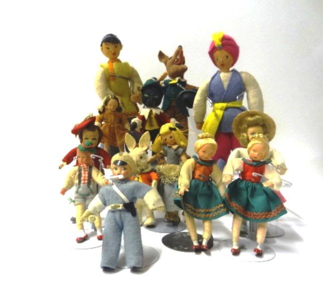 Felt and Composition Dolls: Five felt and composition dolls, one policeman, 2 Italian style, 6 characters - Alice in Wonderland & Rabbit, Puss in Boots, Merry Fox, 2 larger dolls 6 1/2"