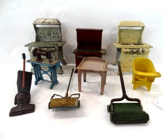 Cast Iron Stoves and Vacuums, Etc.: Anchor & 2 Royal stoves, 4 1/2", 3 vacuums, German sewing marching 3", CI chair, table,