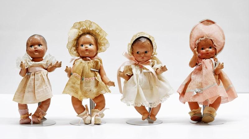 Four Vogue Toddles Dolls: Four 7" Vogue Toddles babies marked Doll Co. on back and Vogue on neck, all w/painted eyes & bent legs, vintage clothes w/no tags, could be from Crib Crowd Series
