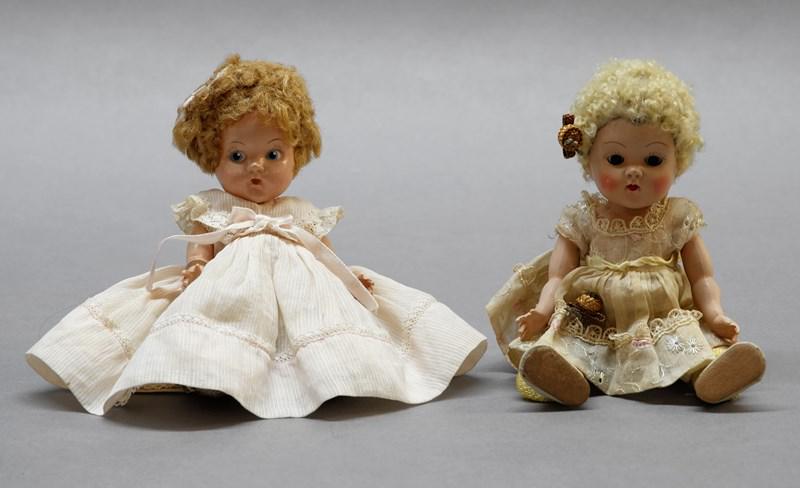 Two Vogue Poodle Hair Dolls: Two Vogue Ginny 7" hard plastic dolls, one painted eye and one fixed eye, both w/bent legs & tagged clothes, could be from Crib Crowd Series