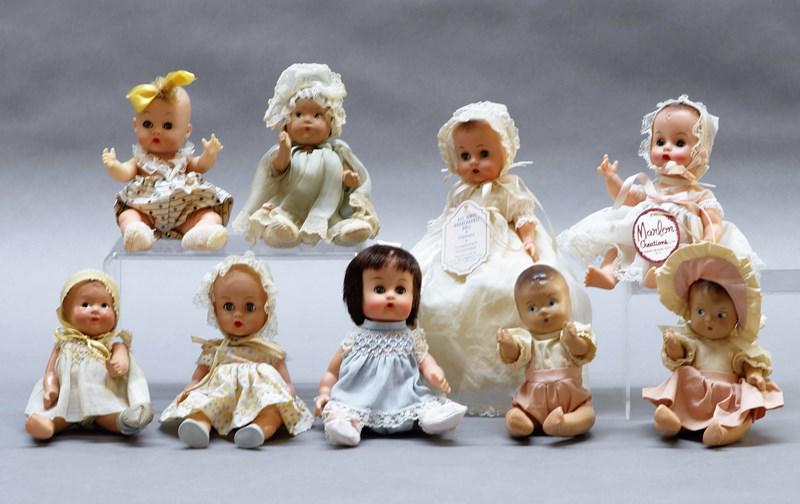 Grouping of Small Dolls: Grouping of five 7" vinyl sleep eye dolls & four 7" painted eye composition dolls, one vinyl is by Marlon Creations and one by J.J. Blumberg Co., all other are unmarked & clothes are not tagged