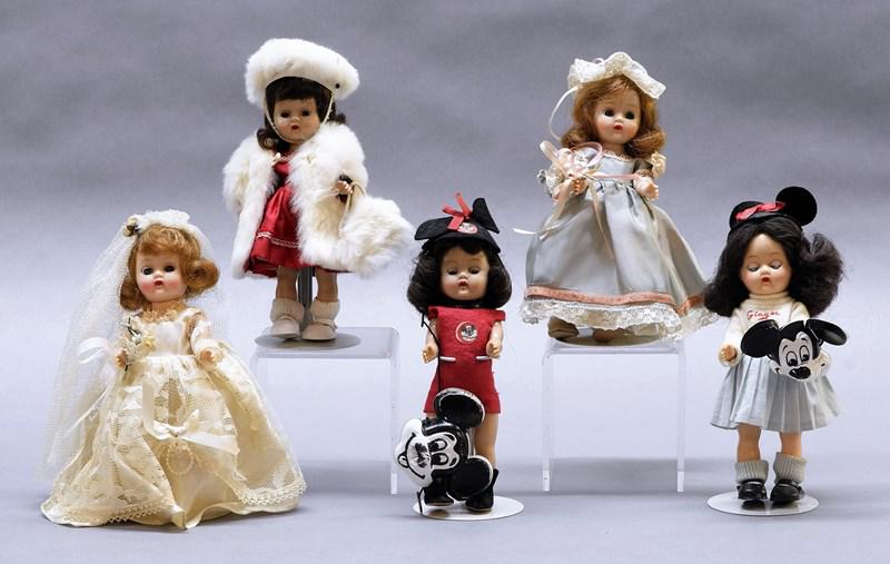 Five Cosmopolitan Ginger Dolls: Ginger Bride & Bridesmaid, two in Mickey Mouse outfits & one in red taffeta w/fur coat, hat & purse, all are tagged except Bridesmaid