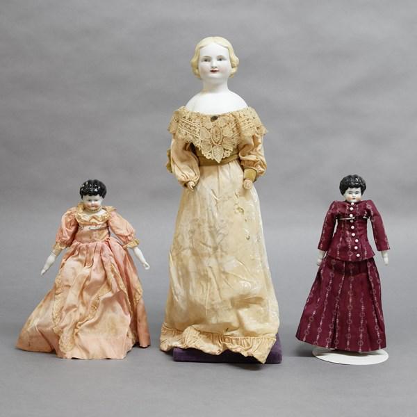 Three Dolls, Parian and Two China Heads: Parian 20" doll (as is), Two 12" china heads, all redressed, cloth bodies w/china hands & legs
