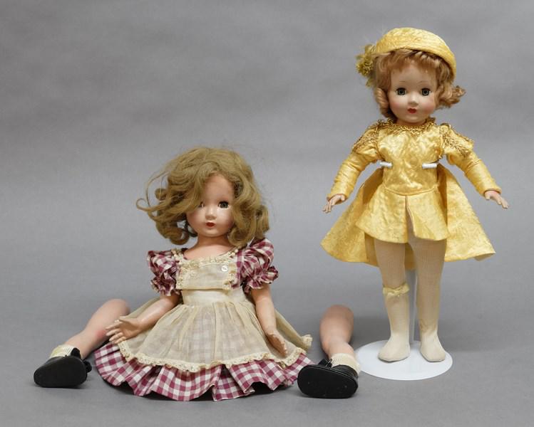 Two Effanbee Honey Dolls: One in dress w/pinafore 16" new shoes, unstrung, smaller 14" dressed as a Prince, yellow w/gold trim, one plastic shoe, other has new shoes, both faces & bodies are in very good condition, faces are v