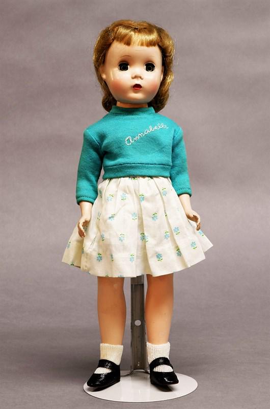 Madame Alexander Annabel Doll: Madame Alexander 14" Annabel doll, has original turquoise sweater, skirt is a replacement