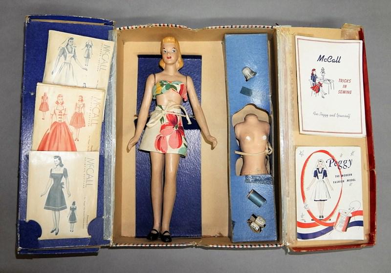 McCall's Peggy Sewing Set: McCall's Peggy The Modern Fashion Model in original box. Includes composition mannequin, three patterns, thimble, thread, measuring tape, and dress form (missing stand), also has 2 booklets