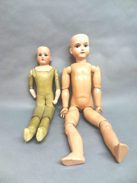 Two Bisque Dolls: Two bisque dolls, Gebruder Kuhnlenz 31", 32, #165k Germany#13, A&M Mabel 25, head has slight hairlines, good composition boy, sleep eyees, open mouth, body very good, leather Gussetted body, some repa