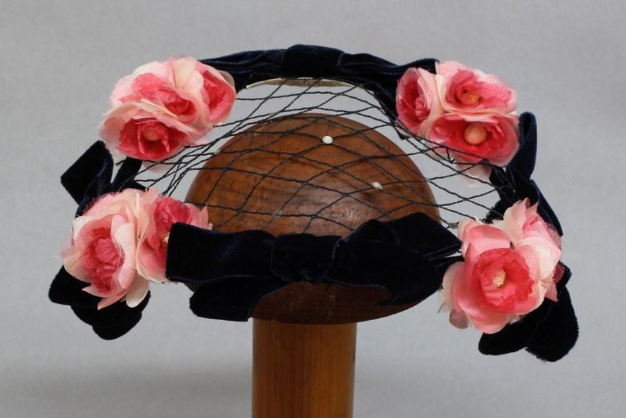 Henri Bendel Floral and Netting Hat: Signed inside hat Henri Bendel, lovely floral, velvet bows & netting, 7", good condition