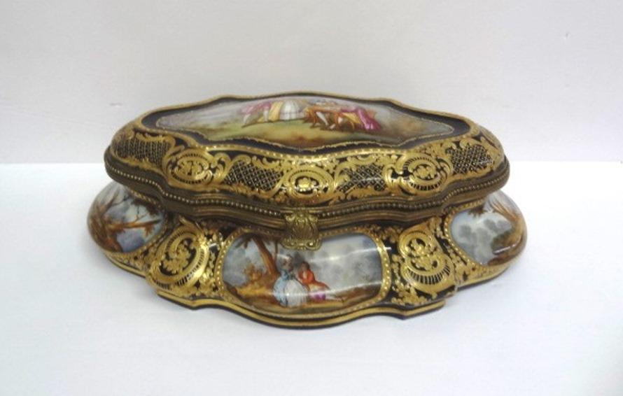 Sevres Louis XVI Table Box signed Watteau: Mounted Sevres Table Box with Porcelain insets, Gilt overall, with courting Scenes in cobalt blue,4.5 "T 13" L x 8 1/2" W, Portraits form around entire box surrounded by Fleur de lie gold Beading and