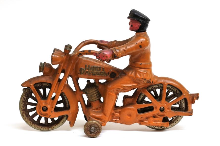 Hubley Cast Iron Motorcycle: Large Hubley Harley cast iron motorcycle with original paint, plated wheels and civilian rider 7"L