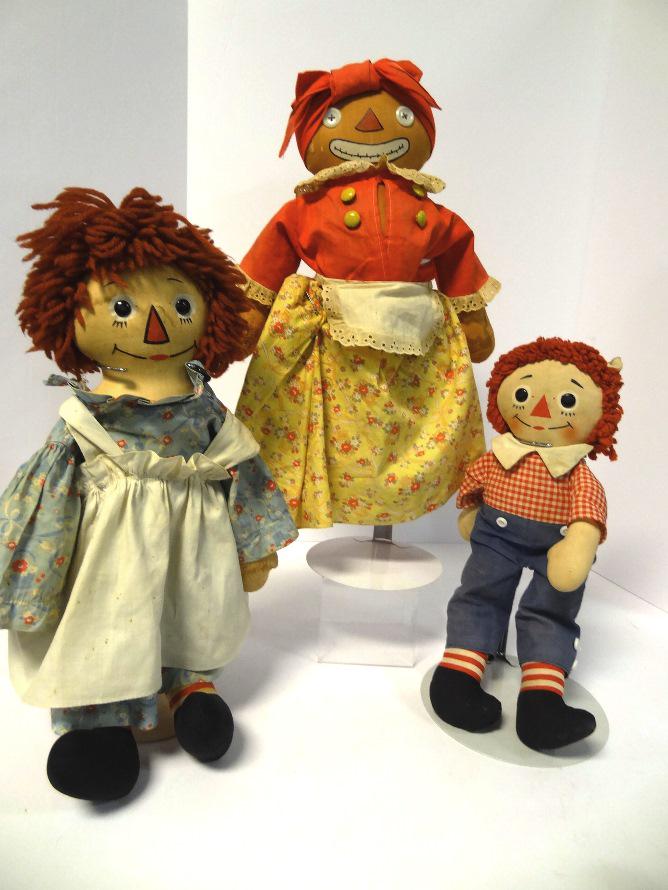 Beloved Belindy and Raggedy Ann with Painted Nose: Beloved Belindy signed on bottom "Johnny Gruels Georgenes Inc. NYC", 19" in original clothing, Raggedy Ann 19" w/painted nose & tag Johnny Gruel, and another rag doll