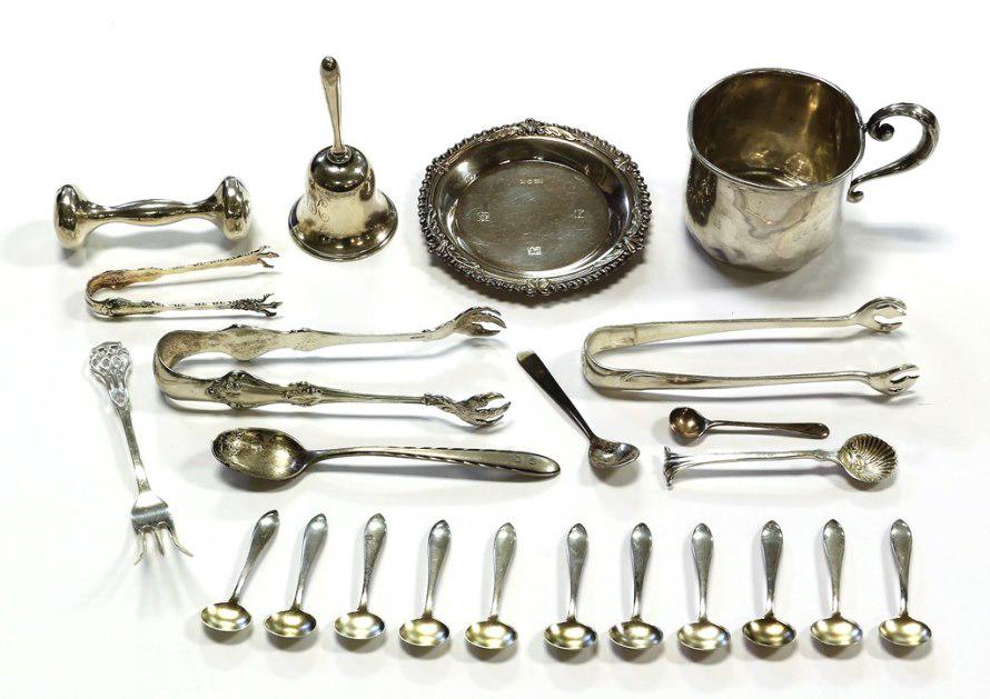 Sterling Silver Table Accessories: Sterling silver bell 3.5"H, tongs, butter dish, rattle, salt spoons and child's cup, 10.7 ozt total weight