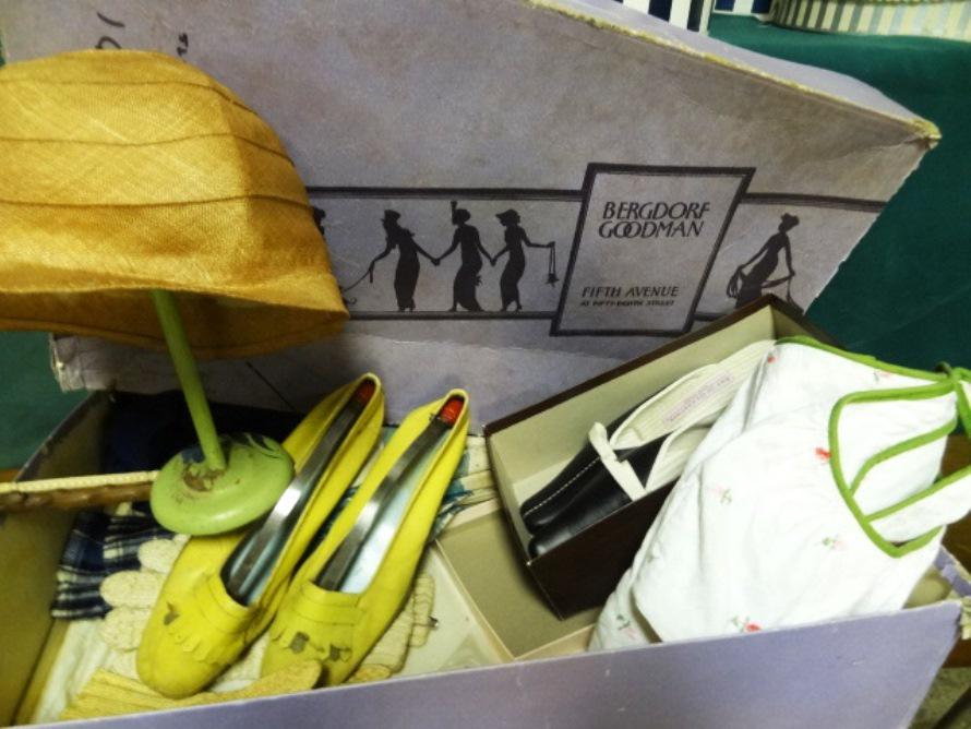 Bergdorf Goodman Box with Vintage Clothing and: Vintage Bergdorf Goodman box, with 1920's Ladies straw Hat, Umbrellas, one bone with carving, Two pairs shoes, some knit4ed gloves , etc.