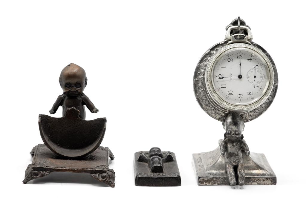 Antique Kewpie Watch stands & Paper Weight: Antique Kewpie cast metal silver colored watch hutch signed on bottom "JB 363" 5"H holding a vintage Waltham pocket watch, watch stand 3.25"H, heavy "Purdue Foundry" ingot paper weight 2 5/8"L