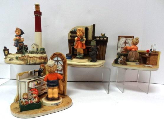 Hummel Scenes: Barnegat Lighthouse, #199D, Kozy Kitchen #1099D, Littlest Teacher # 1141D, Doll Hospital Display #1136D, tallest seven inches includes figures.