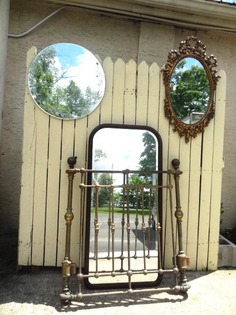 Antique Mirrors and Brass Head Board: Brass Headboard 41"T 37"W, Fancy Mirror 36"T 22"W, Mahogany Mirror 51"T 24"W, Plane Mirror 24"Dia