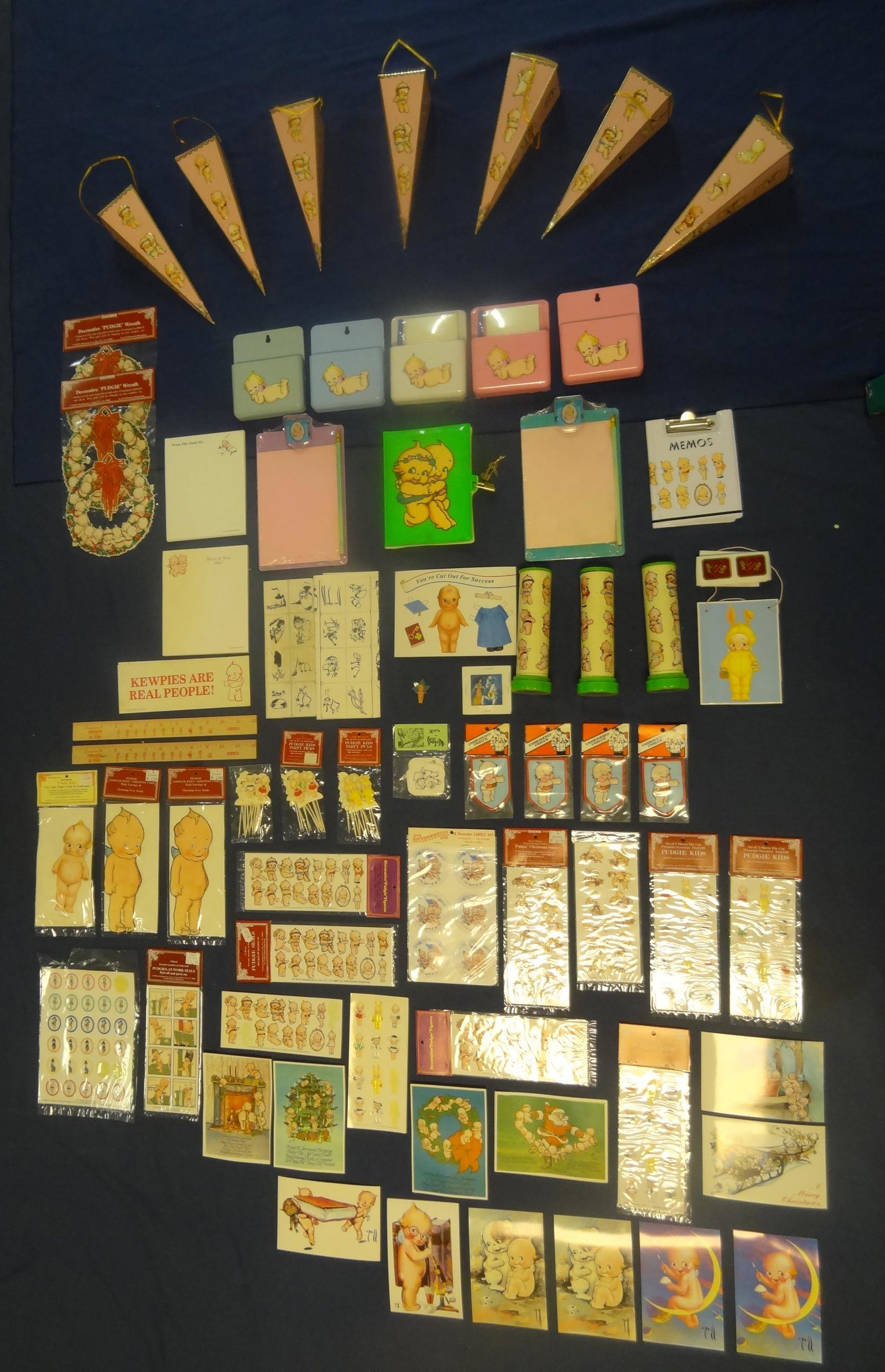 Kewpie Paper Collection: Kaleidoscope, Container, Plastic Note holders rulers, and other items on original packs this is all contemporary