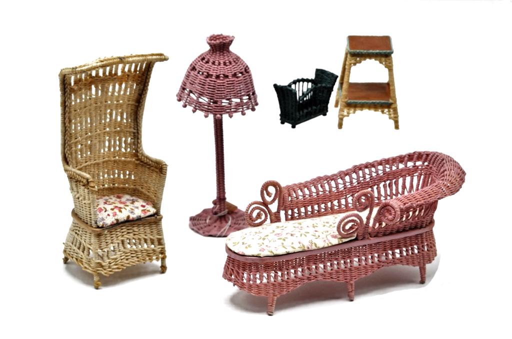 Keonard Dollhouse Wicker Furniture & Others: Signed Keonard side table 2"H and magazine stand 1.75"W, unsigned porter's chair with canopy 5.25"H, unsigned pink daybed 6"L and electrified floor lamp 5"H