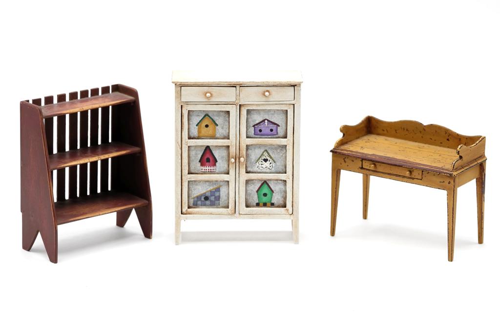Artisan Painted Country Dollhouse Furniture: Terri Hill three shelf case with boot jack legs has a distressed milk paint finish 4"H, 3.25"W, hand painted jelly cupboard has two drawers over two doors decorated with birdhouses signed Lucy "99", 4