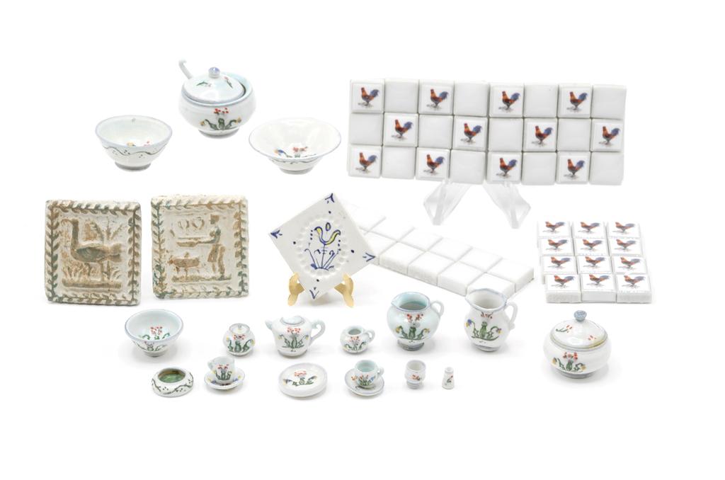 Elisabeth Chambers Dollhouse China: Assortment of Elisabeth Chambers dollhouse china in a matching pattern, includes teapot, sugar, creamer, two cups with saucers, bread plate, egg cup, bud vase, two pitchers, covered jar, set of three 