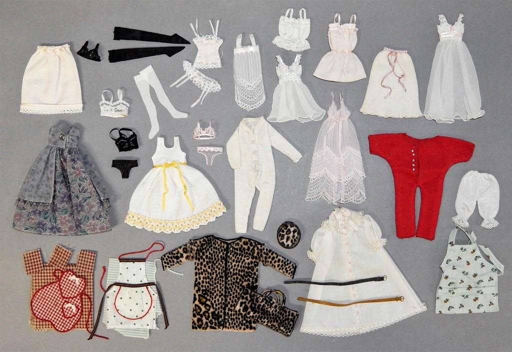 Large Group of Dollhouse Clothing & Linens: Assortment of 1" scale dresses and accessories, dozens of pillows, towels, throw rugs, shawls, small lace items, commercial rugs etc.
