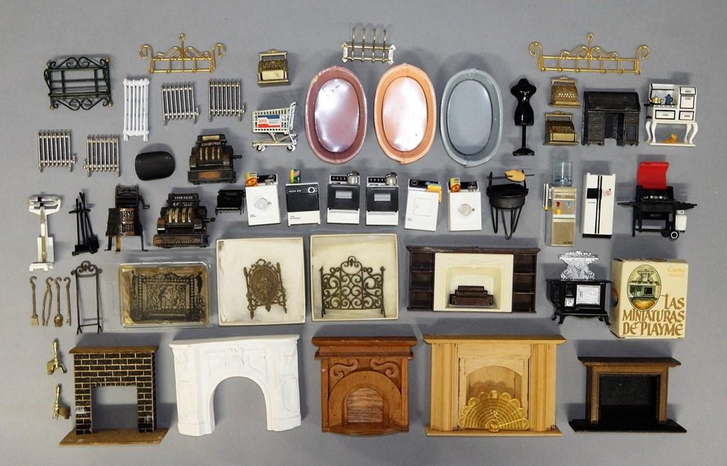 Dollhouse Fireplace Mantels, Cash Registers, Appliances: Five plaster, wood and plastic dollhouse fireplace mantels, three fireplace screens, andirons and tools, brass screen fan, five metal cash registers, typewriter, grill, dress form, metal radiators, th