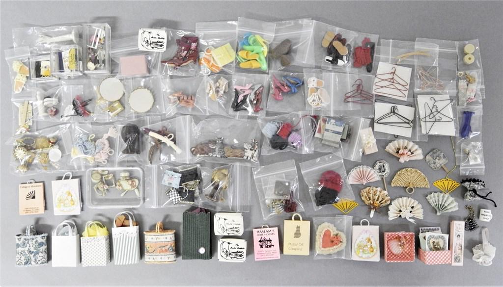 Dollhouse Lady: Selection of dollhouse sized lady's accessories includes jewelry and jewelry box, mirrored trays, vanity sets, Victorian style greeting cards, hats, masquerade masks, jewelry display hands, leather sa