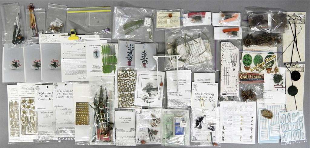 Dollhouse Flower & Garden Kits: Large group of unassembled dollhouse scale flower kits, most with instructions, also includes a wood arbor 6"H, garden tools, shells, plant hangers, sink etc.