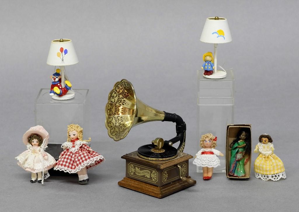 Dollhouse Victrola, Child's Lamps & Dolls: German Bodo Hennig Victrola spins record and plays music when wound 3.5"H, pair of child's electrified table lamps 1.75"H, three small bisque dolls including Little Bo Peep signed A.C. 1.75"H, wood pe