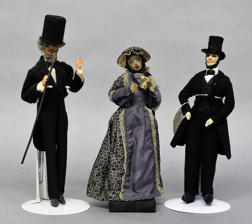 Abraham & Mary Todd Lincoln Dolls: Vintage Mary Todd Lincoln composition doll on wood base signed "This is an original Saroff Character authentically designed and made entirely by hand Mary Todd Lincoln" 10.5"H, cloth Abe Lincoln doll 