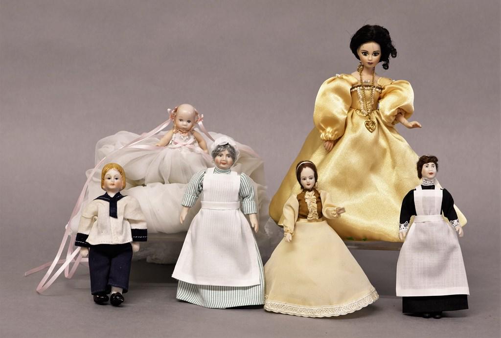 Dollhouse Bisque Dolls: Jointed bisque doll with gown signed illegibly numbered 0436/7500 7"H, maid doll 5.5"H, nurse doll 5.5"H, boy wearing sailor suit 5"H, girl 5"H, baby doll 3" wearing long gown