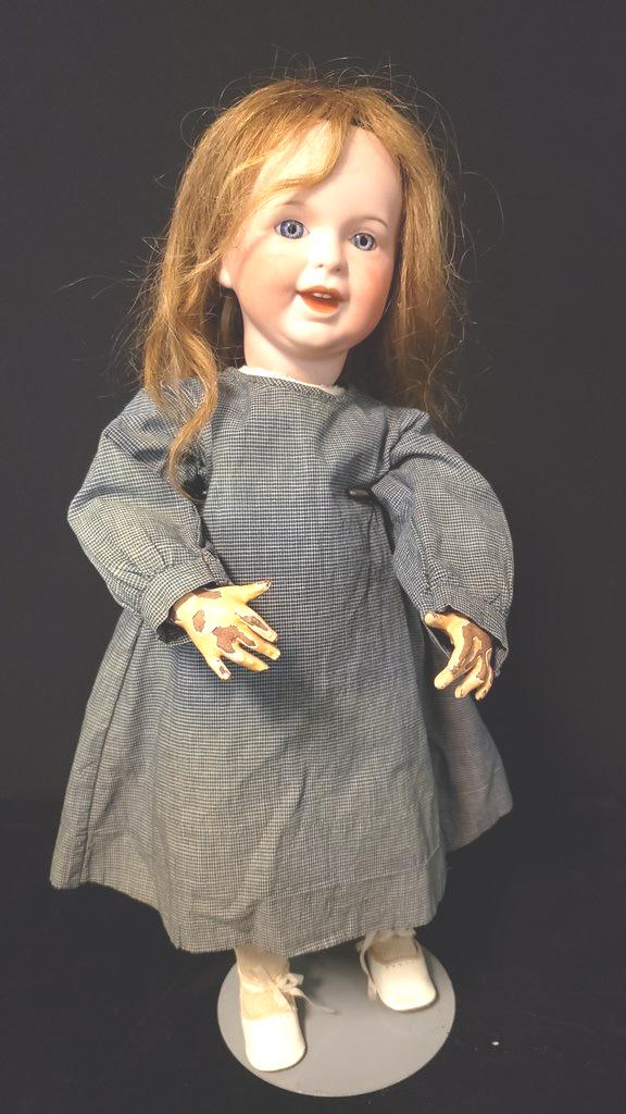 SFBJ 236 Smiling Doll: SFBJ 236 20" Smiling Doll, eyes are stationary body had cut across body and circle also . She has SFBJ White leather shoes, slight rip on one, missing paint on hands, and some of legs. Beautiful Face.