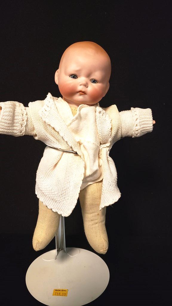 Tynie Baby 1924 10" Horseman: Designed by Bernard Lipfert Bisque Head , Cloth body, Frown on the face, very good condition.