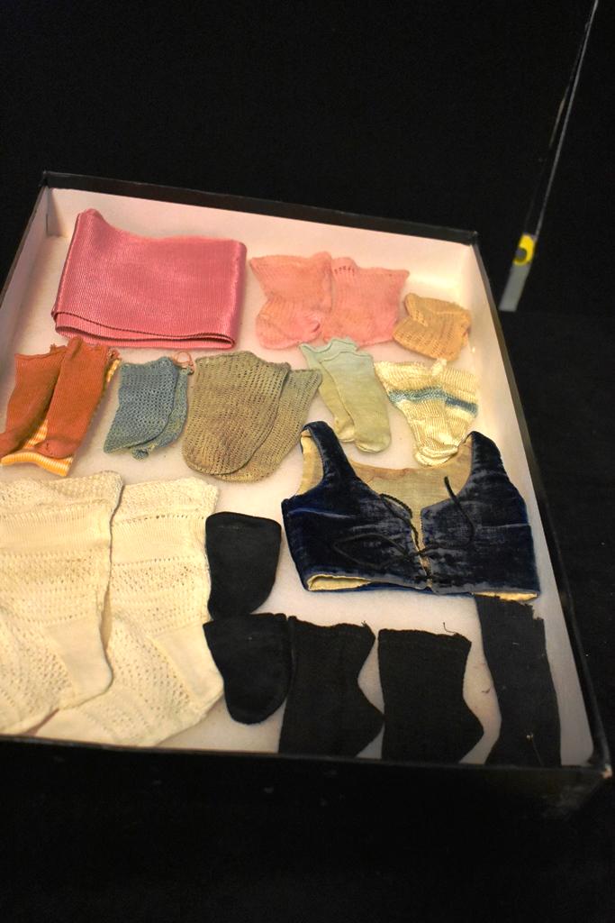 Doll Stocking & Vest: Blue Velvet Vest and group of doll Stockings all colors and styles
