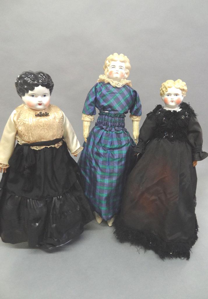 Thee China Head Dolls: Three China Head Dolls all shoulder heads, one is contemporary 16. 17. 21 1/@ most have repairs they are as us