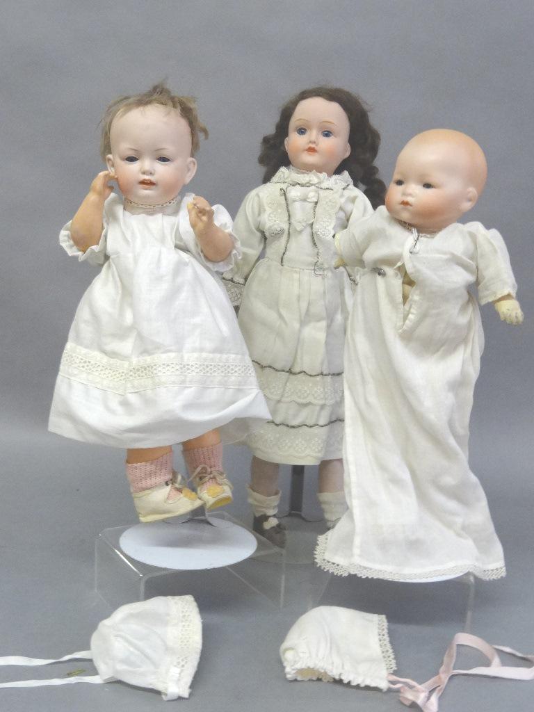 Three Bisque Dolls: #604 B&P doll characters doll 12", one has glued wig, vintage dress & shoes, body good, stationary eyes, unmarked shoulder head 18", stationary eyes old wig glued, body bisque & arms & legs head hands